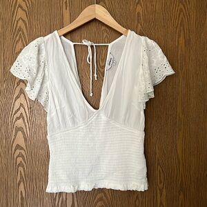 Eyelet tie top